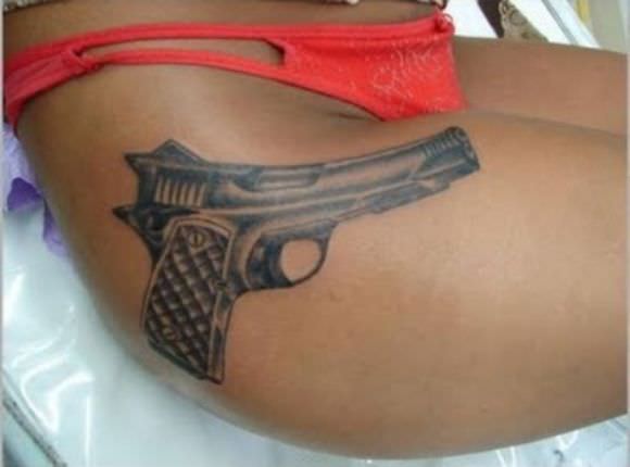 gun tatttoos