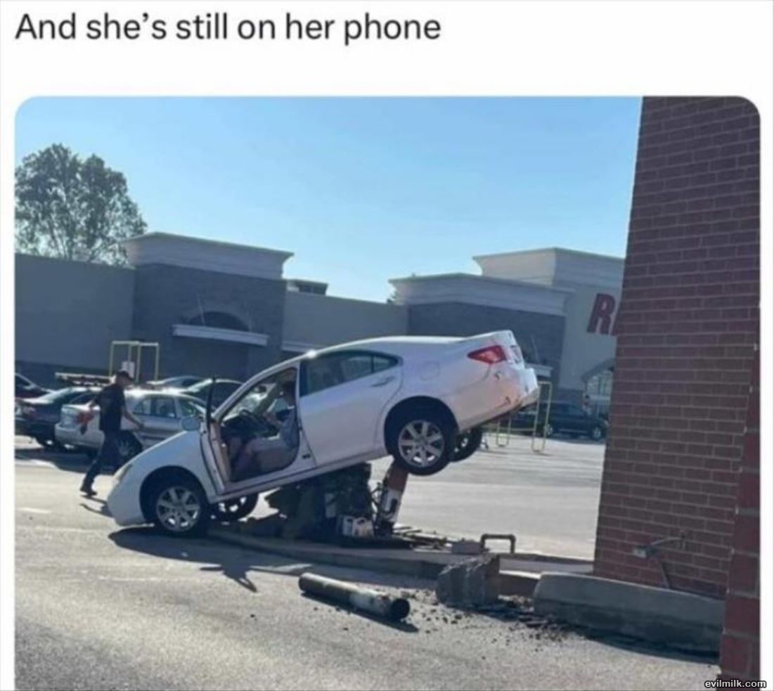 Still On Her Phone