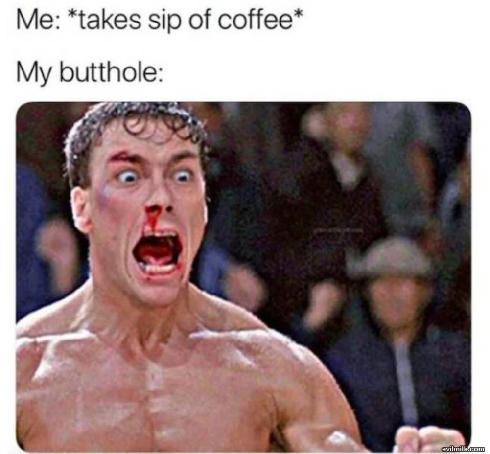 Takes Sip Of Coffee