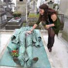 Girls posing with their favorite statues 7